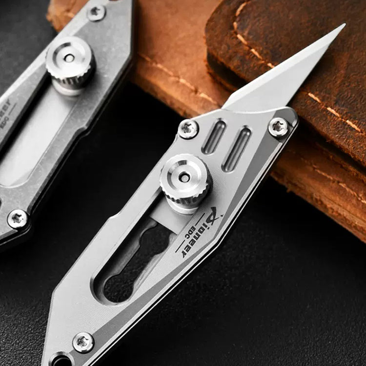 Titanium Mini Knife: Slide & Lock Retractable Cutter with Multifunctional Keychain Design