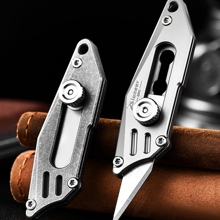 Titanium Mini Knife: Slide & Lock Retractable Cutter with Multifunctional Keychain Design
